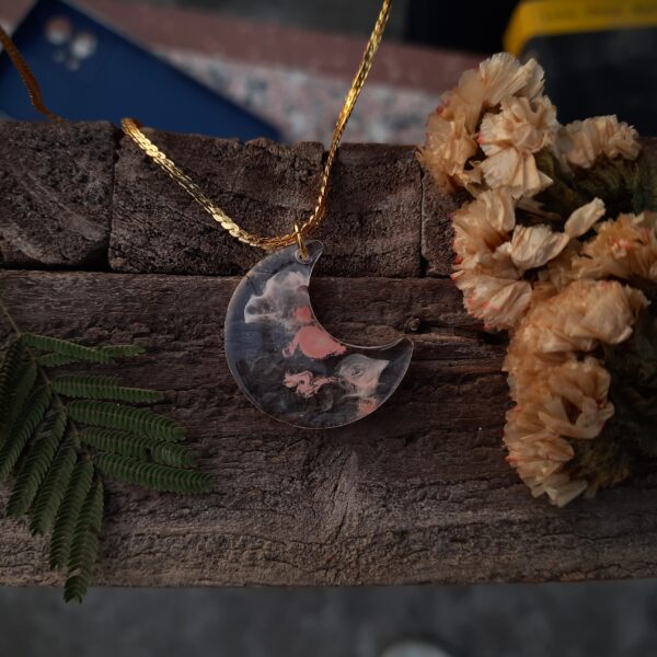 Crescent Moon Pendant Necklace with Abstract Design